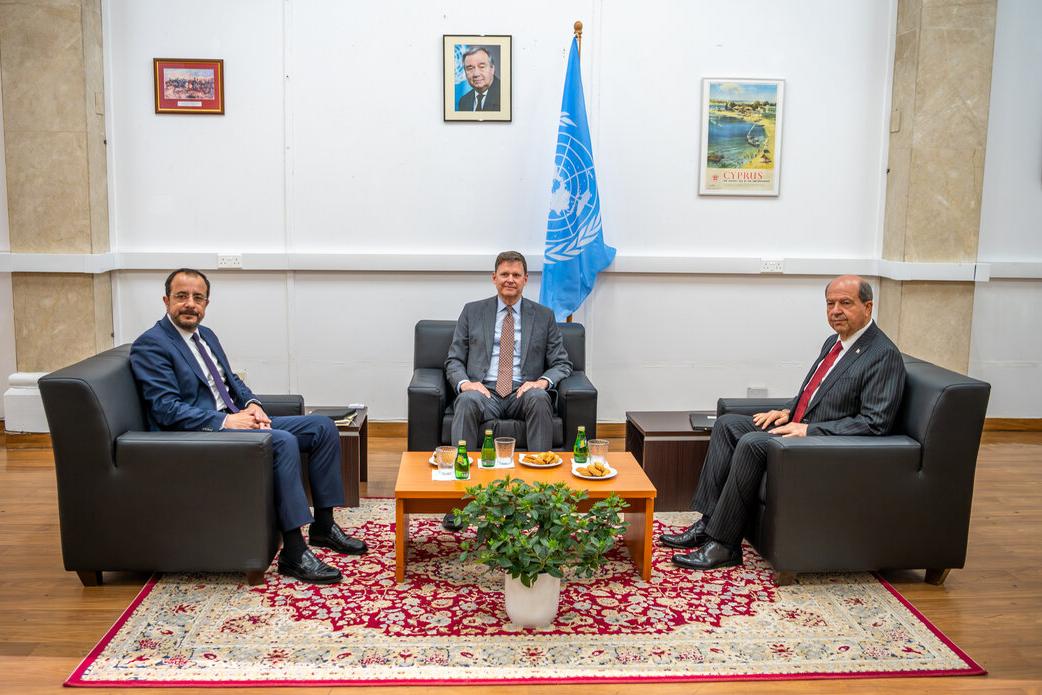 The top United Nations official in Cyprus, Colin Stewart (center), with the Greek Cypriot leader, Nikos Christodoulides (left)  and the Turkish Cypriot leader, Ersin Tatar (right).