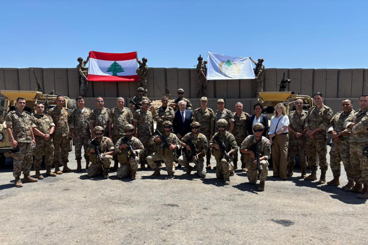 Arnault surrounded by soldiers at Border Regiment 3