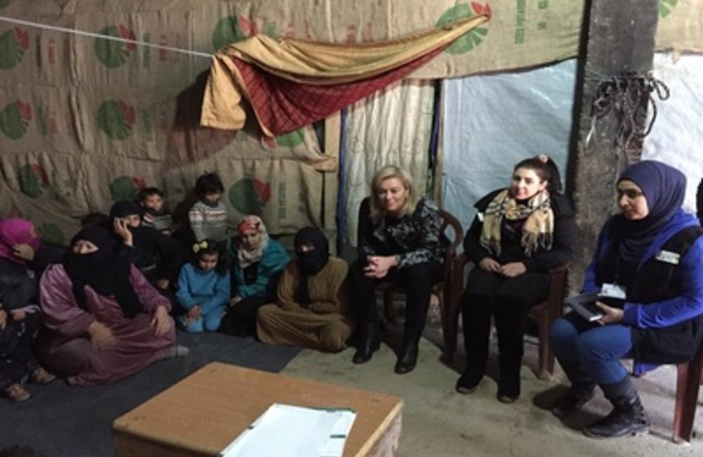 SCL Sigrid Kaag meets refugees at site in Fayda-Omarieh (26 02 15)